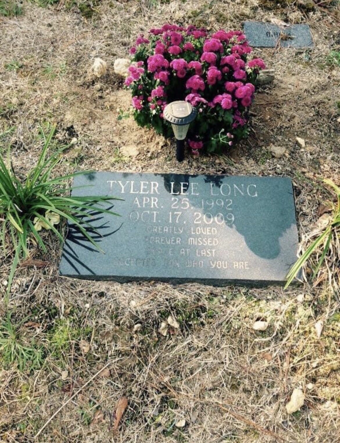 Tyler Long's headstone, greatly loved, forever missed