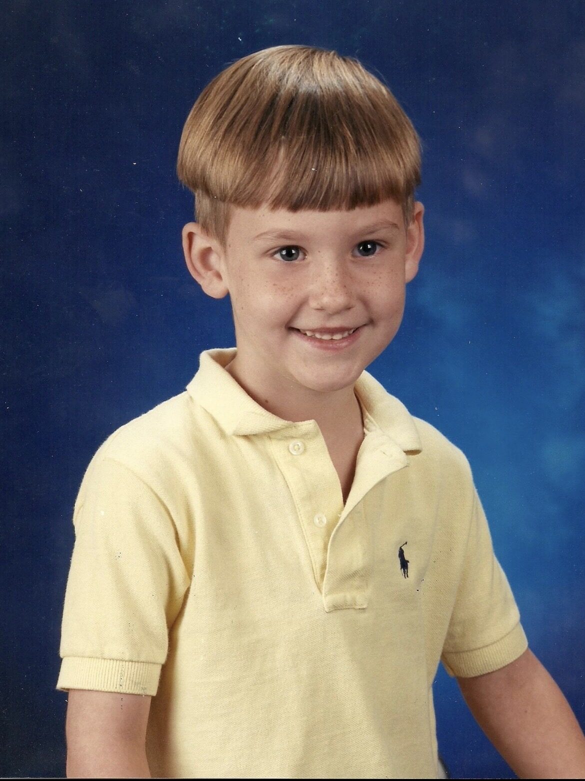 Tyler's school portrait as a young boy