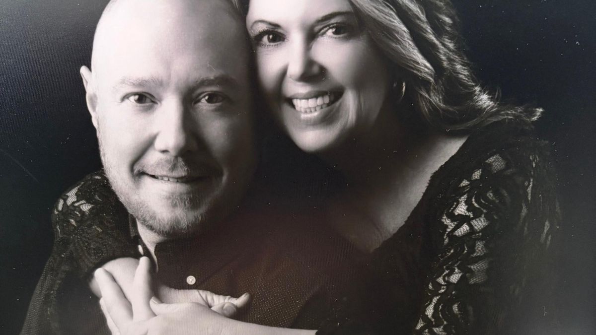 Portrait of Tina and her husband, black and white