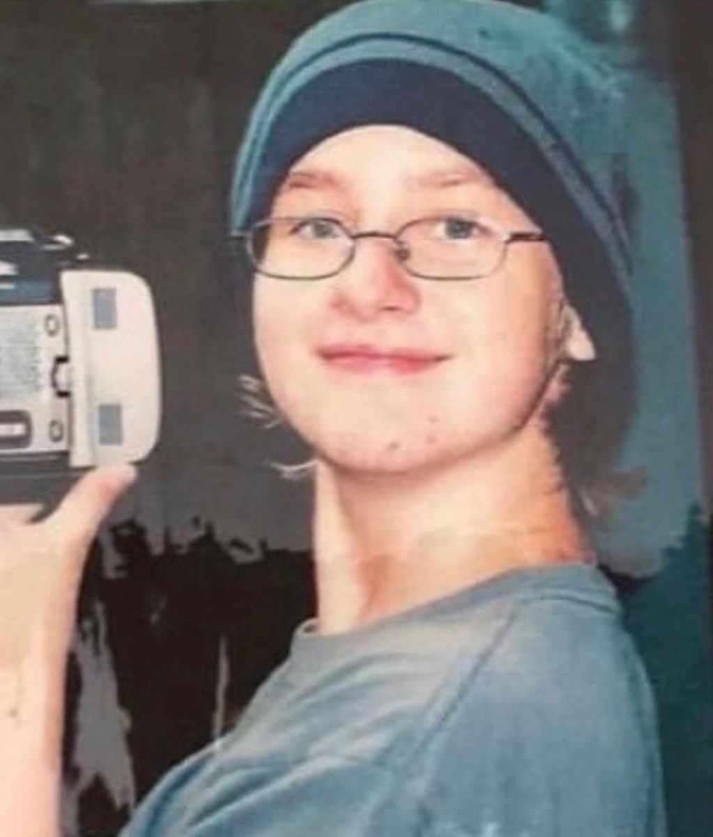 Teenage Tyler taking a selfie with a digital camera